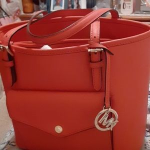Orange color Michael Kors purse